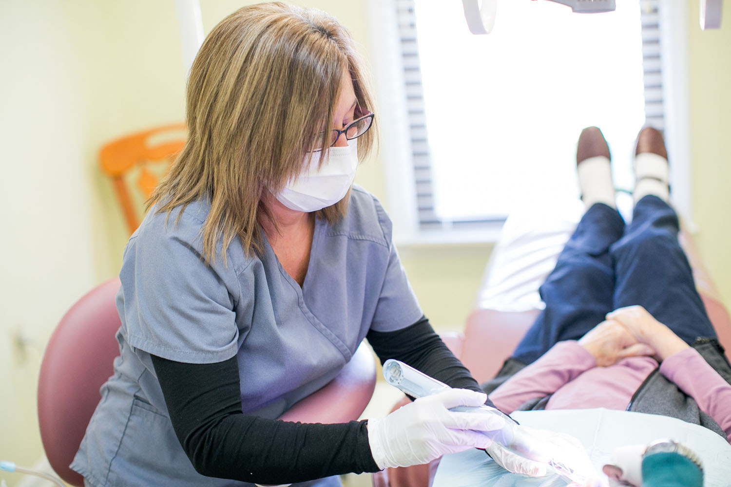 Hometown Dental Lancaster staff provides dental cleaning for patients Hometown Dental Lancaster staff provides dental cleaning for patients